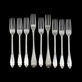 Nine Continental Silver Fruit Forks