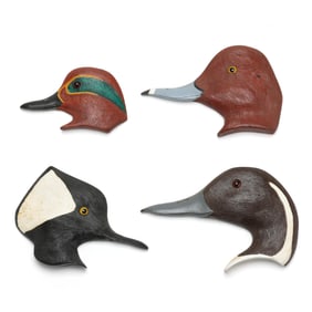 Merritt Pennock (MD), Four Carved Profile Heads