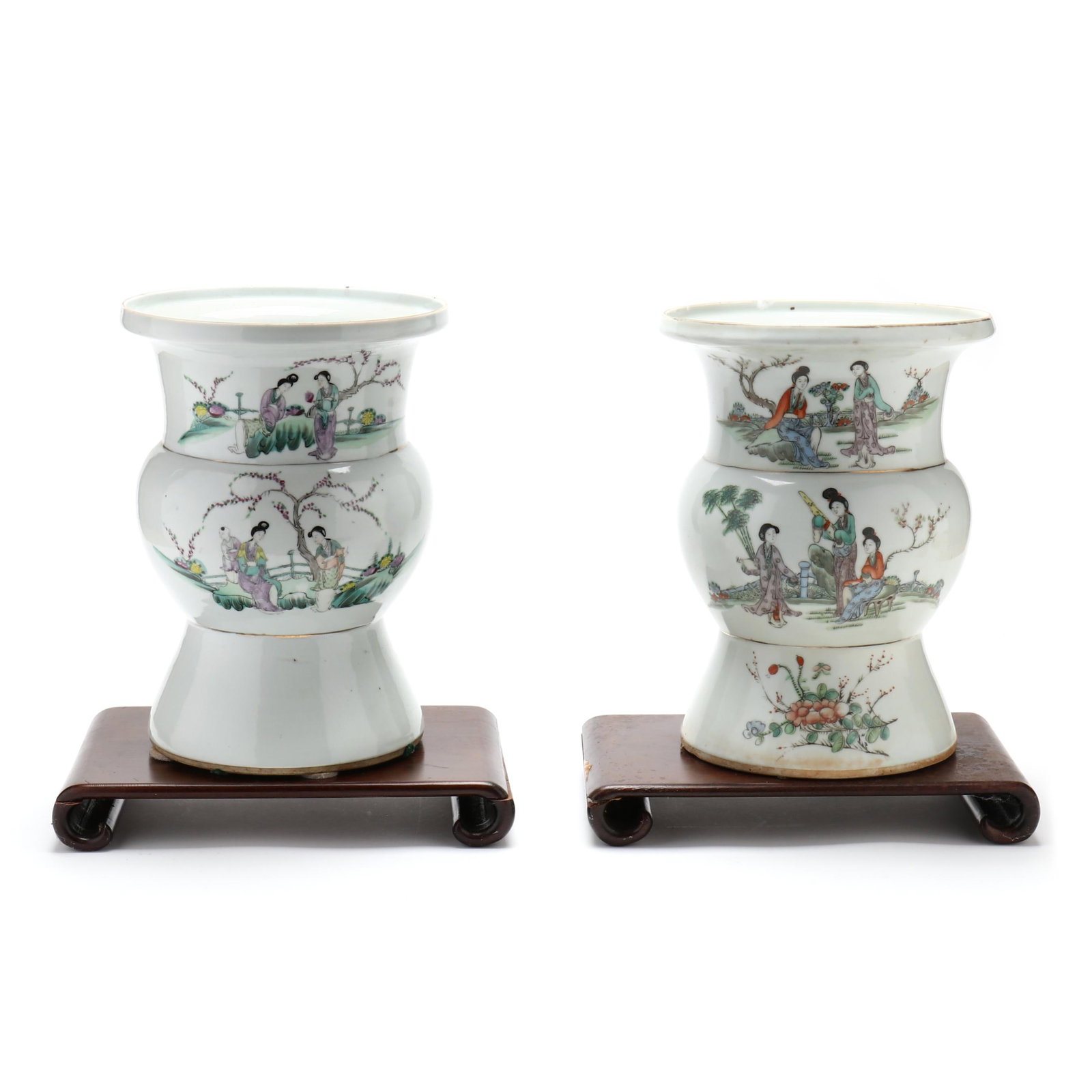 Pair of Chinese Export Famille Rose Jardinieres: Pair of Chinese Export Famille Rose Jardinieres Republic period (1911-1949), featuring scenes of figures in a courtyard with blooming cherry blossoms, presented with carved wood stands, not marked. Th