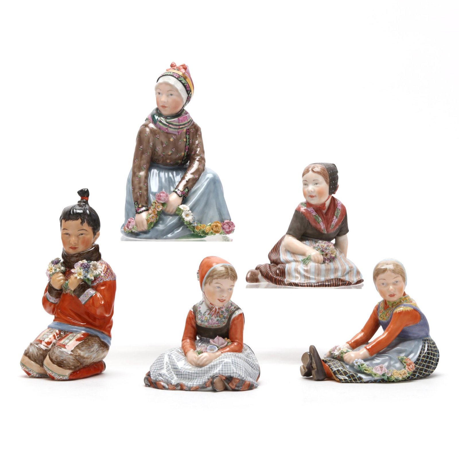 A Group of Five Royal Copenhagen Figurines: A Group of Five Royal Copenhagen Figurines Denmark, first half 20th century, porcelain with overglaze, designed by Carl Martin-Hansen, to include: #12413 Fanoe girl with garland (5 1/2 in.); #12415 Gr
