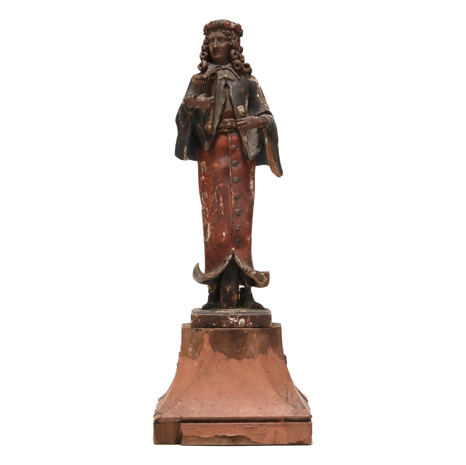 Continental Polychrome Carving of a Youth With Harp and Mallet: Continental Polychrome Carving of a Youth With Harp and MalletNorthwest European, 18th century or earlier, carved wood with gesso, polychrome and gilt decoration, perhaps a representation of a young D