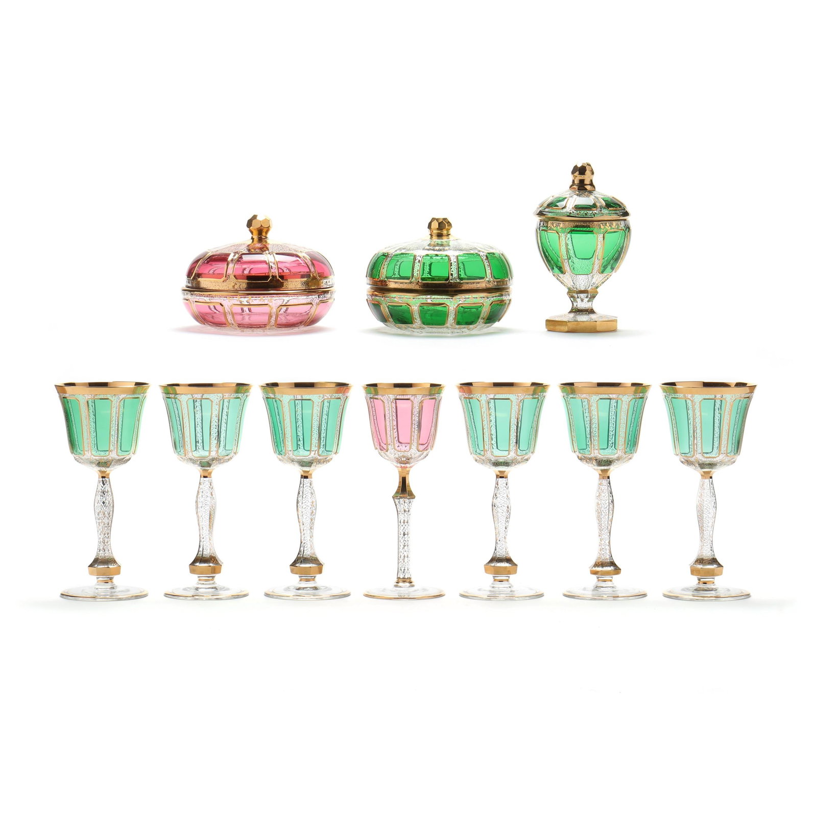 Attributed Moser, Set of Colored Crystal Glassware and Table Accessories: Attributed Moser, Set of Colored Crystal Glassware and Table Accessories early 20th century, all in a uniform faceted pattern with gold highlights, includes (6) green and (1) pink wine goblets (8 1/4 