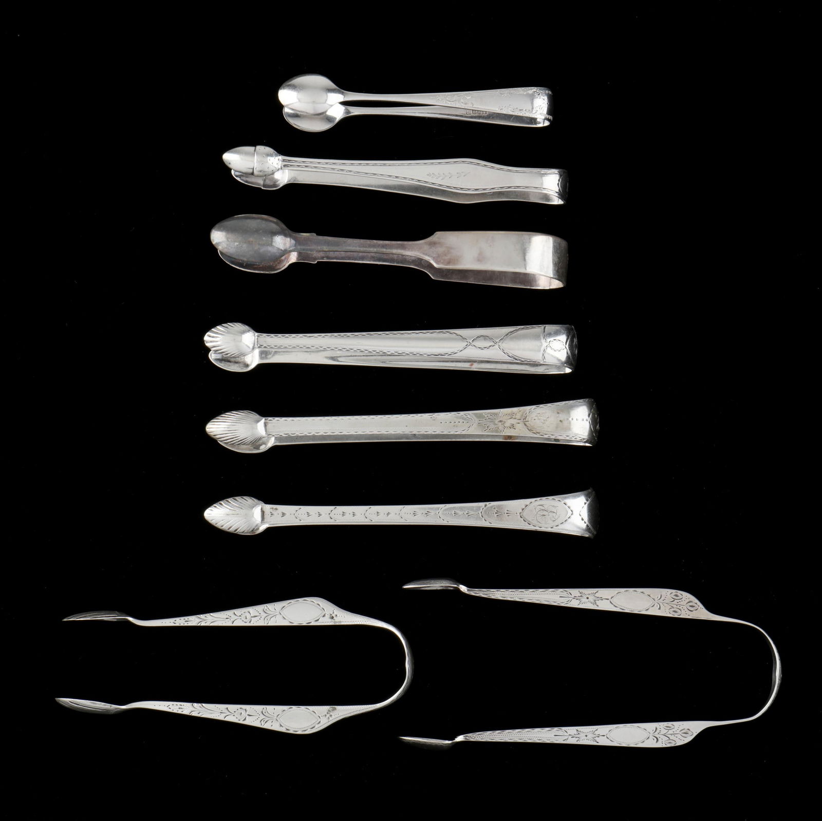 Collection of Silver Tongs, Mostly Irish and Irish Provincial: Collection of Silver Tongs, Mostly Irish and Irish Provincialmostly George III period, includes one with provincial mark of Carden Terry and John Williams, Cork; a similar pair marked "Sterling"; two