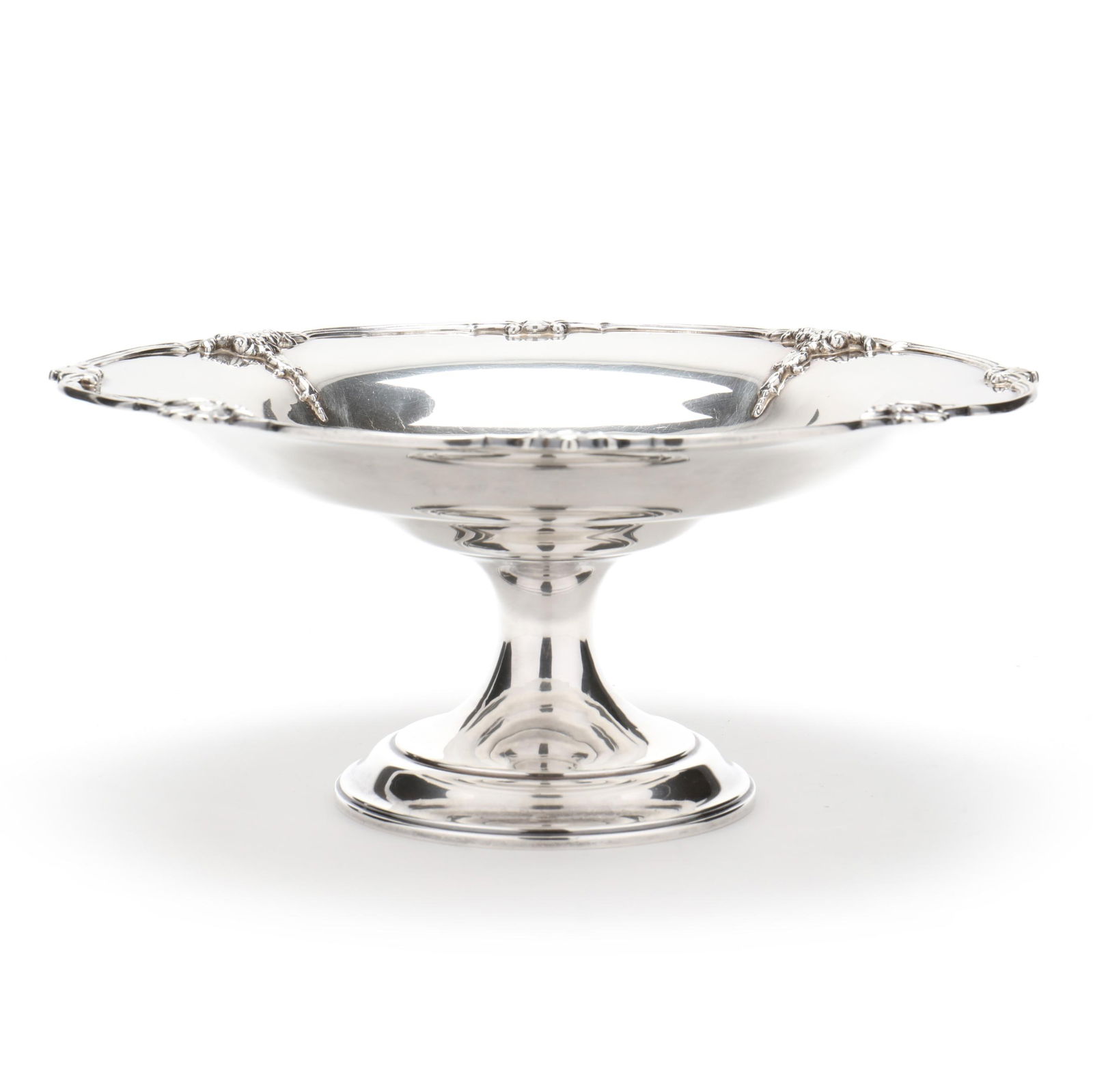 A George V Silver Pedestal Bowl: A George V Silver Pedestal Bowlmark of Adie Bros. Ltd., Birmingham (1925), featuring a shell and bellflower motif to shaped rim of bowl, no monogram or engraving. 5 x 11 in. diameter 19 troy oz. Addi