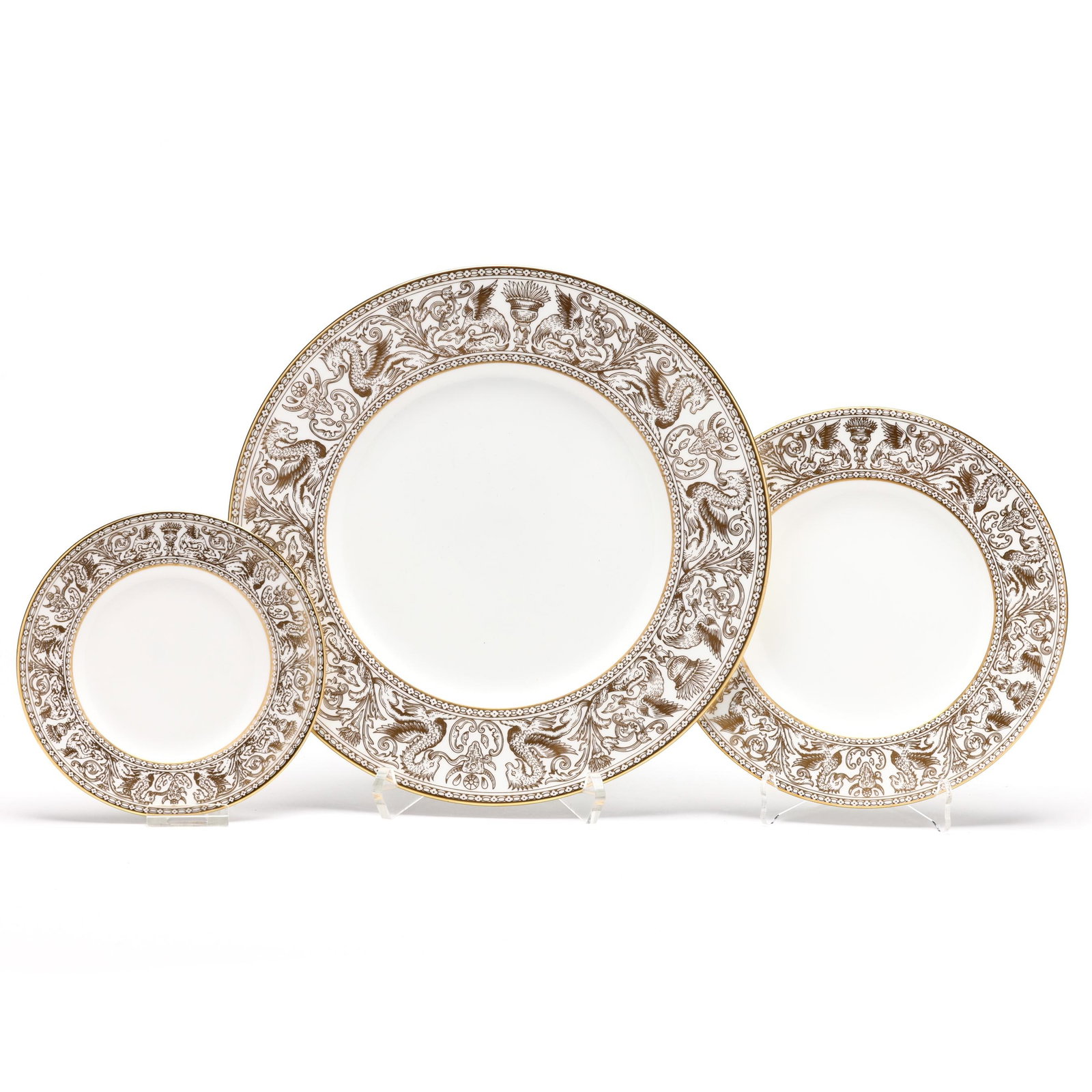 A Group of Wedgewood Gold Florentine Plates: A Group of Wedgewood Gold Florentine Plates(36) pieces, England, second half 20th century, with gold dragons on white ground, to include: (12) dinner plates (10 5/8 in.); (12) salad plates (8 1/8 in.)