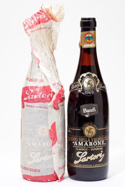 1969 Amarone della Valpolicella: Amarone della Valpolicella 1969 2 bottles Classico Superiore, Sartori 2-3.5cm, 1 original tissue Removed from a large subterranean wine cellar of an avid Buffalo, New York wine collector and wine educ