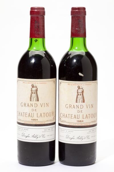 1964 Chateau Latour: Chateau Latour "...The dark opaque garnet/purple color is followed by Latour's classic nose of minerals, walnuts, and cassis. Full-bodied, concentrated, and rich, the 1964 Latour is clearly the Pauill