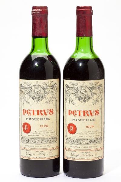 1975 Petrus: Petrus "...this wine still has a murky garnet/plum/purple color, a gorgeous nose of overripe black cherries, mocha, caramel, chocolate, and a hint of iron and blood. Full-bodied, super-concentrated, w