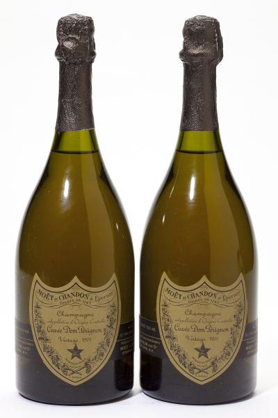 1975 Moet & Chandon, Dom Perignon: Moet & Chandon Champagne19752 bottlesDom Perignonboth 1.5cm below bottom of foilRemoved from a large subterranean wine cellar of an avid Buffalo, New York wine collector and wine educator.