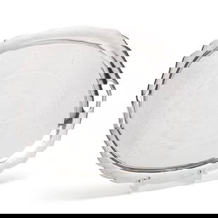 A Large Mexican Sterling Silver Serving Tray, Mark of Tane Orfebres: A Large Mexican Sterling Silver Serving Tray, Mark of Tane OrfebresMexico City, circa 1952 or after, featuring a scalloped rim, double handles, and four paw feet, not monogrammed. 17 1/8 x 23 in. 79.8
