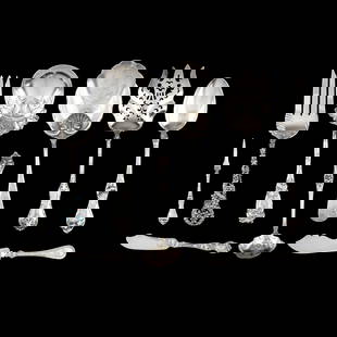 Nine Ornate Sterling Silver Flatware Servers: Nine Ornate Sterling Silver Flatware Servers includes an enameled filigree fork marked "Sterling"; an antique serving fork retailed by Marshall Field & Co., with period monogram; (5) Art Nouveau