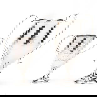 Two Sterling Silver Trophy Cups: Two Sterling Silver Trophy Cups the larger, mark of Durgin, pattern number 63, with a stepped foot and gold wash bowl, stylized "K" monogram; the smaller, mark of Gorham, pattern number A8058,