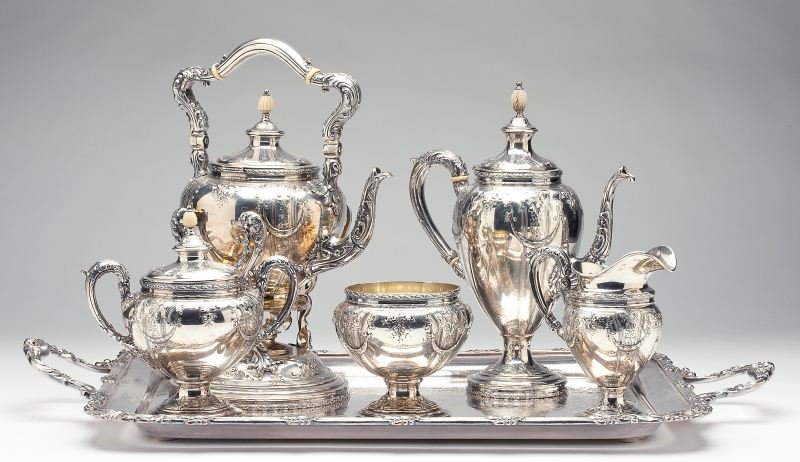 Dominick & Haff Sterling Silver Coffee Service: Dominick & Haff Sterling Silver Coffee Service in their "Basket of Flowers" pattern, the five piece set includes a coffeepot (12 in.), kettle on stand, cream jug, lidded sugar bowl, and waste bowl; no