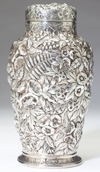 S. Kirk & Son Silver "Repousse" Caster: S. Kirk & Son Silver "Repousse" Caster circa 1861-1868, marked "S. Kirk & Son / 11 OZ," bold floral and fern repousse motif to body and pierced cover. 6 in. 7.8 troy oz. Elizabeth Harrington of Saraso