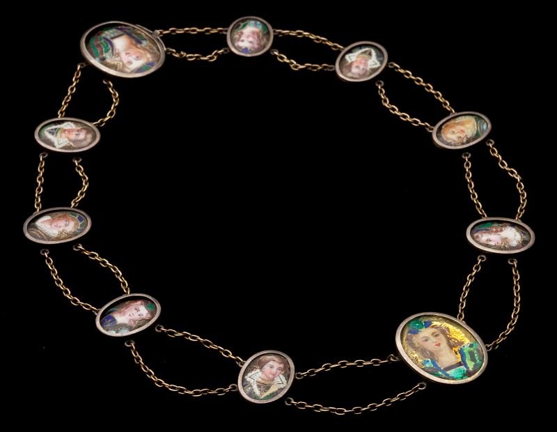 Antique Enamel Portrait Necklace: Antique Enamel Portrait Necklace Continental, 19th century, designed as a graduated line of oval portraits done in enamel set between swag link chain, completed by a push in clasp, mounted in silver o