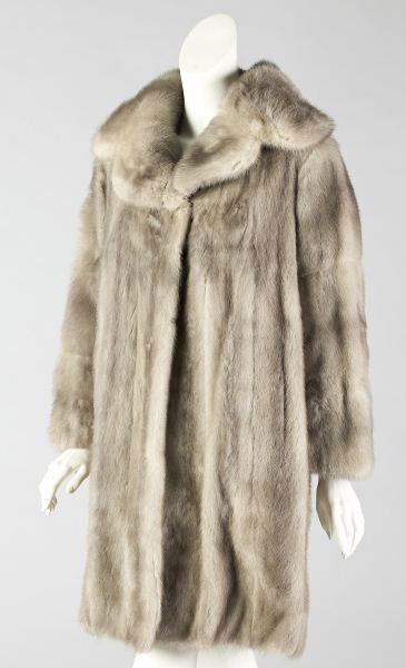A Fine Silver Mink Coat, Elsa Schiaparelli: A Fine Silver Mink Coat, Elsa Schiaparellimid-20th century, designed as a three quarter length coat composed of unusually colored grey mink with a scalloped collar, lined in silk with Schiaparelli sig