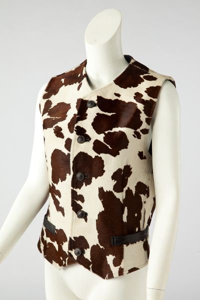 A Fine Pony Hair and Leather Vest, Gianni Versace: A Fine Pony Hair and Leather Vest, Gianni VersaceItalian, 1990s, designed as a traditional vest with the Versace twist, the outside composed of hand painted brown and white pony hair in a zebra patter