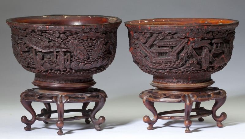 Pair of Chinese Carved Cinnabar Lacquer Bowls: Pair of Chinese Carved Cinnabar Lacquer Bowls Qing Dynasty, each with inscribed Qianlong reign mark (possibly of the period) with gilt detail, each deeply carved with a figural landscape featuring pag