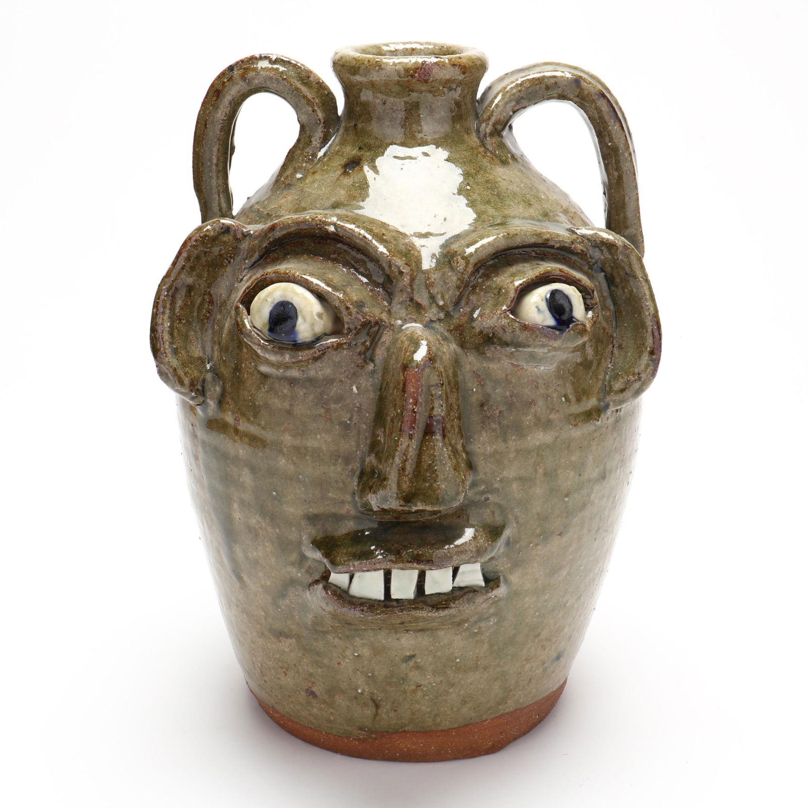 Burlon Craig (Vale, NC, 1914-2002), Two Handled Face Jug: Burlon Craig (Vale, NC, 1914-2002), Two Handled Face JugLincoln County, alkaline glazed stoneware with applied features, kaolin eyes with blue pupils, one row of porcelain teeth, stamped "B.B. CRAIG/V