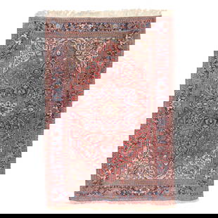 Persian Room Size Carpet: Persian Room Size Carpetwool on cotton foundation, the light red field with large central medallion surrounded by floral motifs in red and blue, the cream spandrels with foliate motifs, the main blue