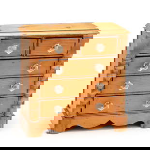 Antique English Miniature Pine Chest of Drawers: Antique English Miniature Pine Chest of Drawers19th century, raised panel top, two over three drawers with glass pulls, applied half turned stiles, flush sides, front scalloped skirt. 13 x 13 x 6 in.