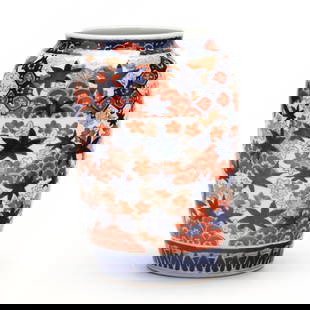 A Japanese Imari Porcelain Vase with Maple Leaves: A Japanese Imari Porcelain Vase with Maple LeavesEdo or Meiji period, 19th century, porcelain hand painted in the Imari palette with maple leaves in blue and autumn leaves and textile motifs in iron r