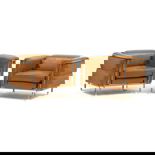 after Le Corbusier, Pair of LC2 Lounge Chairs: after Le Corbusier, Pair of LC2 Lounge Chairsmid 20th century, brown leather seats, grey painted steel frames, unmarked. 26 x 36 x 31 in.  Additional high-resolution photos are available at www.leland