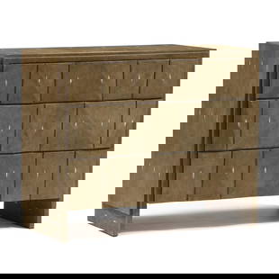 R&Y Augousti, Shagreen Wrapped  Rhomboid  Chest of Drawers: R&Y Augousti, Shagreen Wrapped Rhomboid Chest of Drawerscirca 1990, stingray leather over mahogany, flush raised panel case with three long drawers with geometric raised panels, flush base, finished m