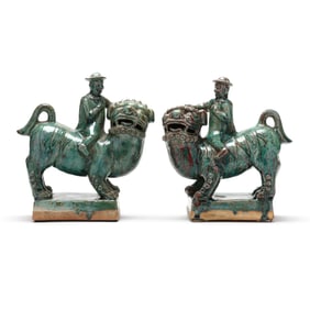 A Pair of Chinese Teal Glazed Ceramic Foo Dogs and Riders