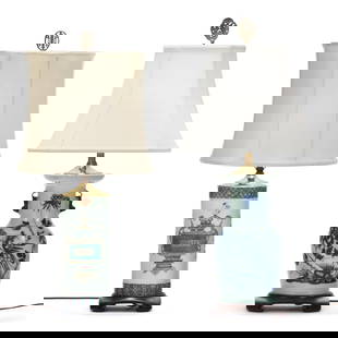 Two Chinese Porcelain Vase Lamps: Two Chinese Porcelain Vase Lamps19th century, includes a large vase hand painted in blue with a large phoenix in a lush garden and an immense peony blossom, vase is flanked with foo dog faux handles,