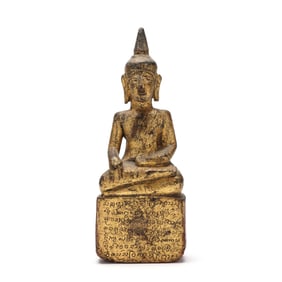 A Thai Gilt and Painted Wood Seated Buddha