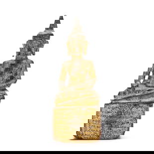 A Thai Gilt and Painted Wood Seated Buddha: A Thai Gilt and Painted Wood Seated Buddha18th or 19th century, a carved wood seated Buddha, gilt to figure and front of base, front of base has an inscription in Thai, red pigment to sides and back o