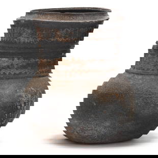 A Korean Stoneware Jar with Wave Decoration: A Korean Stoneware Jar with Wave DecorationThree Kingdoms (57 BC–AD 668), Gaya, stoneware with accidental ash glaze, neck encircled with incised bands of wave decoration. 6 1/8 x 5 1/2 in. For a sim