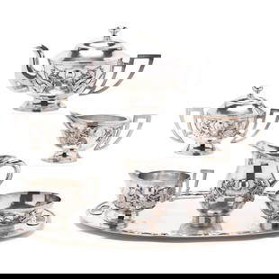 Chinese Export Silver  Dragon Chasing Pearl  Tea Service: Chinese Export Silver Dragon Chasing Pearl Tea Service20th century, XRF tests 95% silver, with various marks to the underside, a likely assembled service featuring dragon chasing pearl symbolism to th