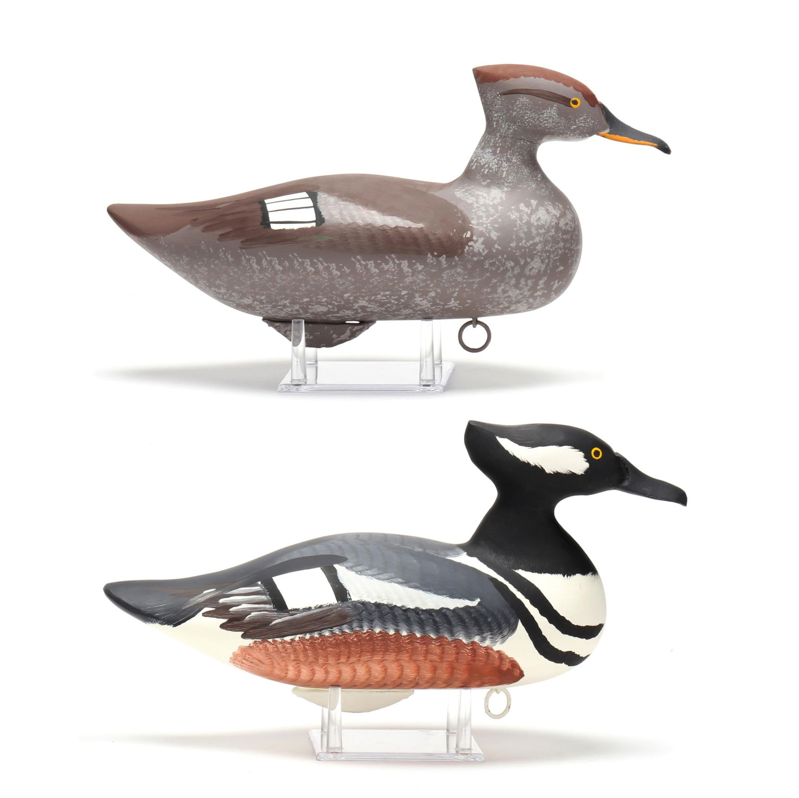 Captain Harry Jobes (MD, 1936-2019), Pair of Hooded Mergansers: Captain Harry Jobes (MD, 1936-2019), Pair of Hooded MergansersHavre de Grace, Maryland, carved and painted wood, signed and dated 2001 by maker on bottom of each. Length 14.75 in. A master decoy carve