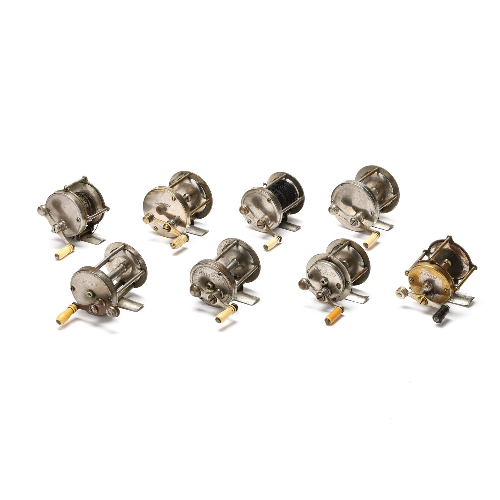 Eight Vintage Baitcasting Reels: Eight Vintage Baitcasting Reelsearly 1900s, to include eight reels, Chief (80), Quadruple (60), Ideal (40), Defiance (60), Meteor (unmarked), Rainbow (40), The Acme (60) and Arrow (60), nickel-plated