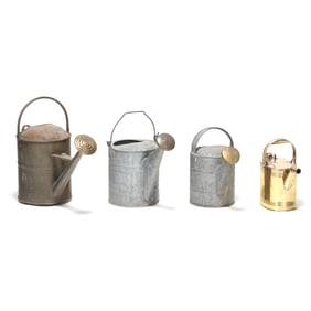 A Group of Galvanized Watering Cans