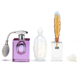Three Glass Perfume Bottles and a Bird