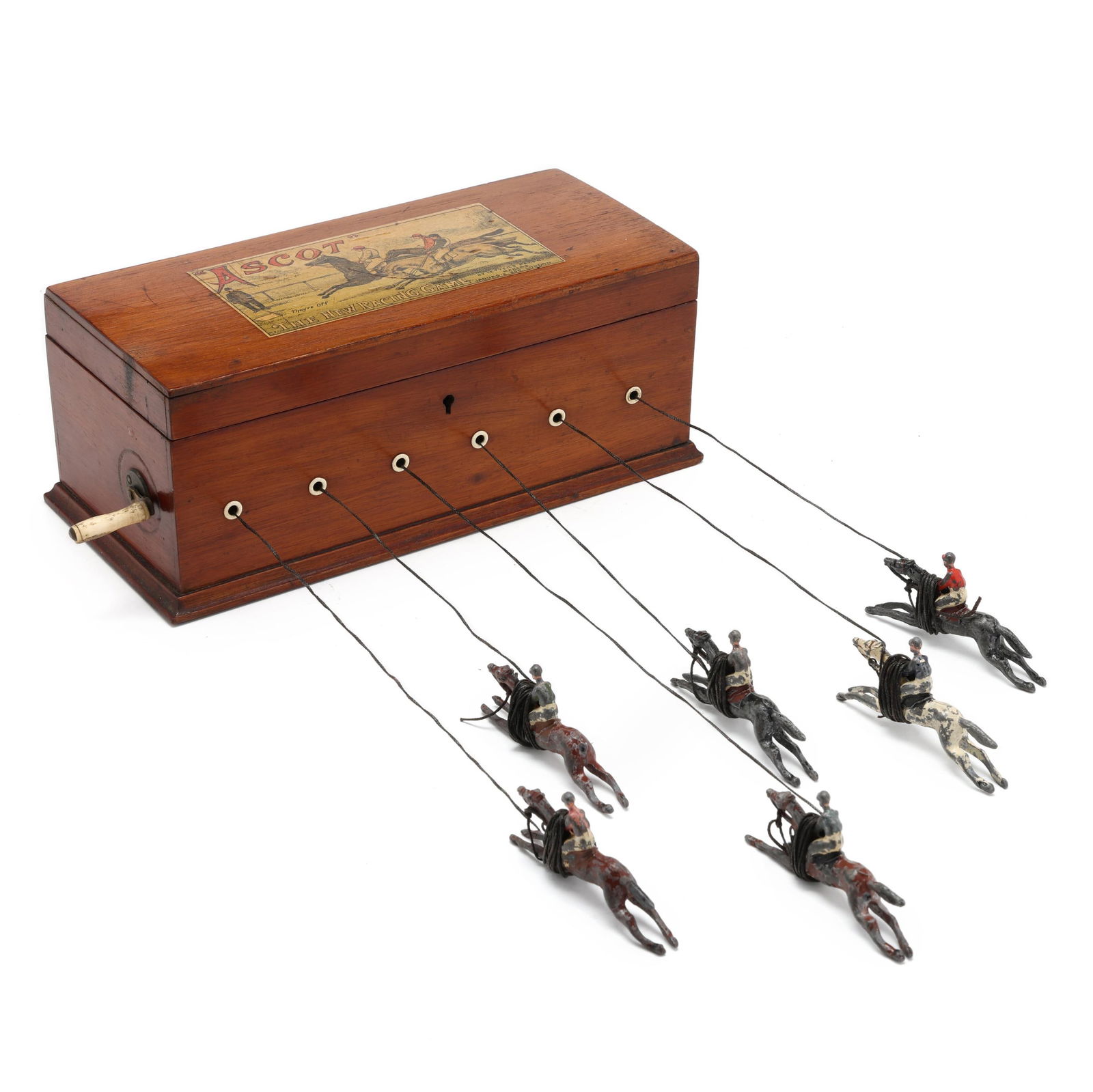 John Jaques & Son Ltd, Ascot “The New Racing Game: John Jaques & Son Ltd, Ascot “The New Racing Game” London, circa 1900, rectangular mahogany box with bone eyelet mounts, hinged lid with printed horse race label marked "ASCOT / They're Off/ T