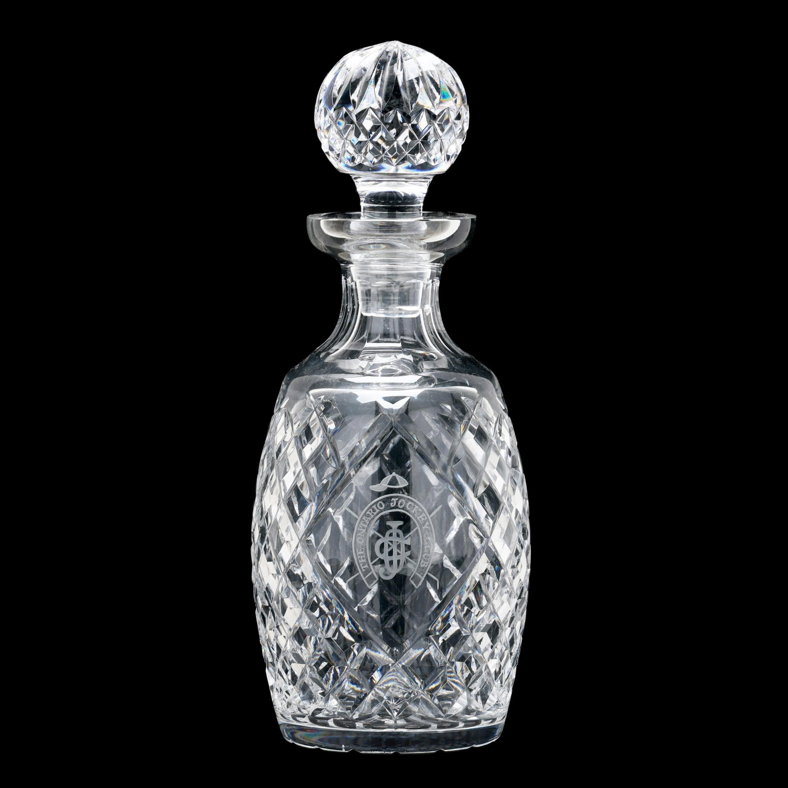Waterford Alana Decanter for the Ontario Jockey Club: Waterford Alana Decanter for the Ontario Jockey Clublate 20th century, spirit decanter with stopper, engraved with "THE ONTARIO JOCKEY CLUB" logo to body and company mark to base. 10 3/4 x 4 1/2 in. F