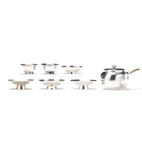 A Group of Japanese Silver Bowls and Teapot