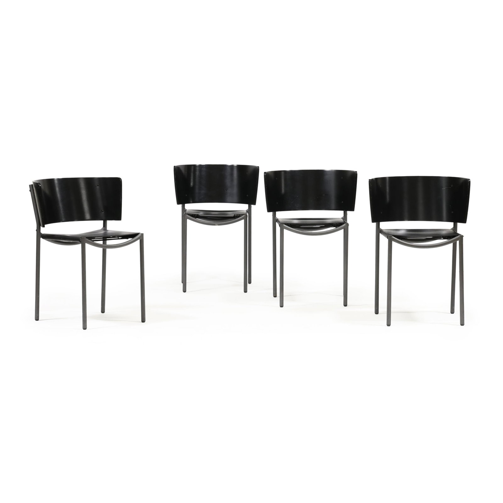 Philippe Starck (French, b. 1949), Four Lila Hunter Chairs: Philippe Starck (French, b. 1949), Four Lila Hunter Chairslate 20th century, black lacquered bent laminated wood backs, black leather seats with strap supports, grey powder coated steel frame, appears