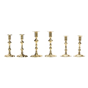 Three Pairs of George II Brass Candlesticks