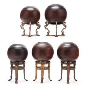 Five Inlaid Wood Lawn Bowling Balls with Brass Stands