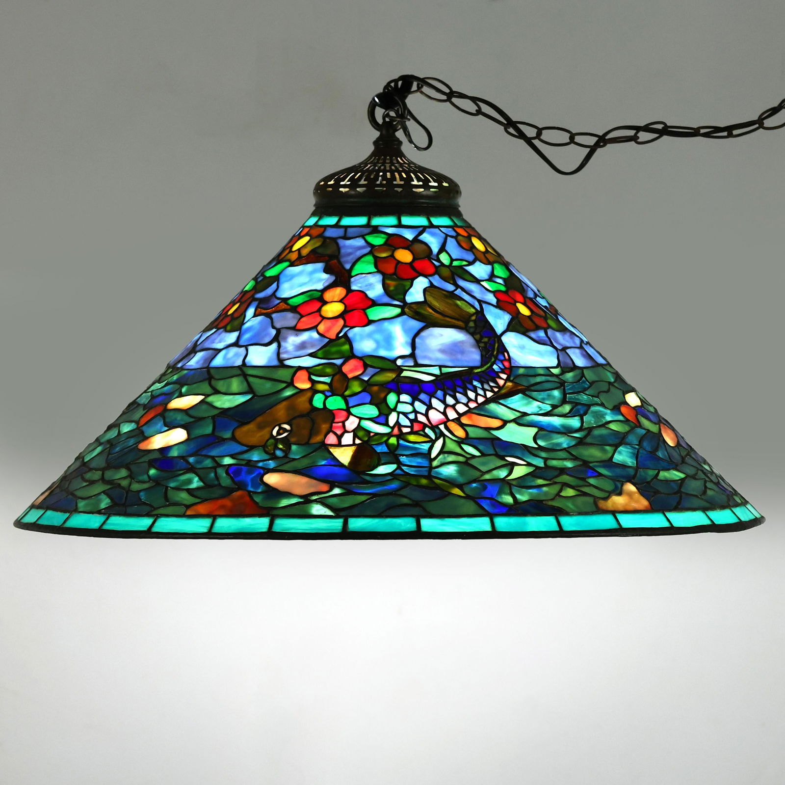 American Leaded Glass Hanging Shade, Fish and Flowering Branch: American Leaded Glass Hanging Shade, Fish and Flowering Branchsecond half 20th century, conical leaded glass chandelier, featuring a multicolored fish and floral design against a blue and green field,