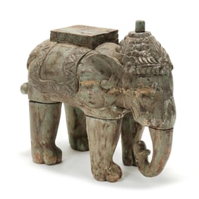 An Indonesian Carved and Painted Wood Elephant
