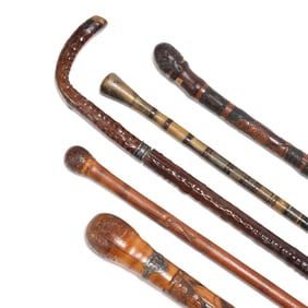 Collection of Five Exotic Carved Walking Sticks