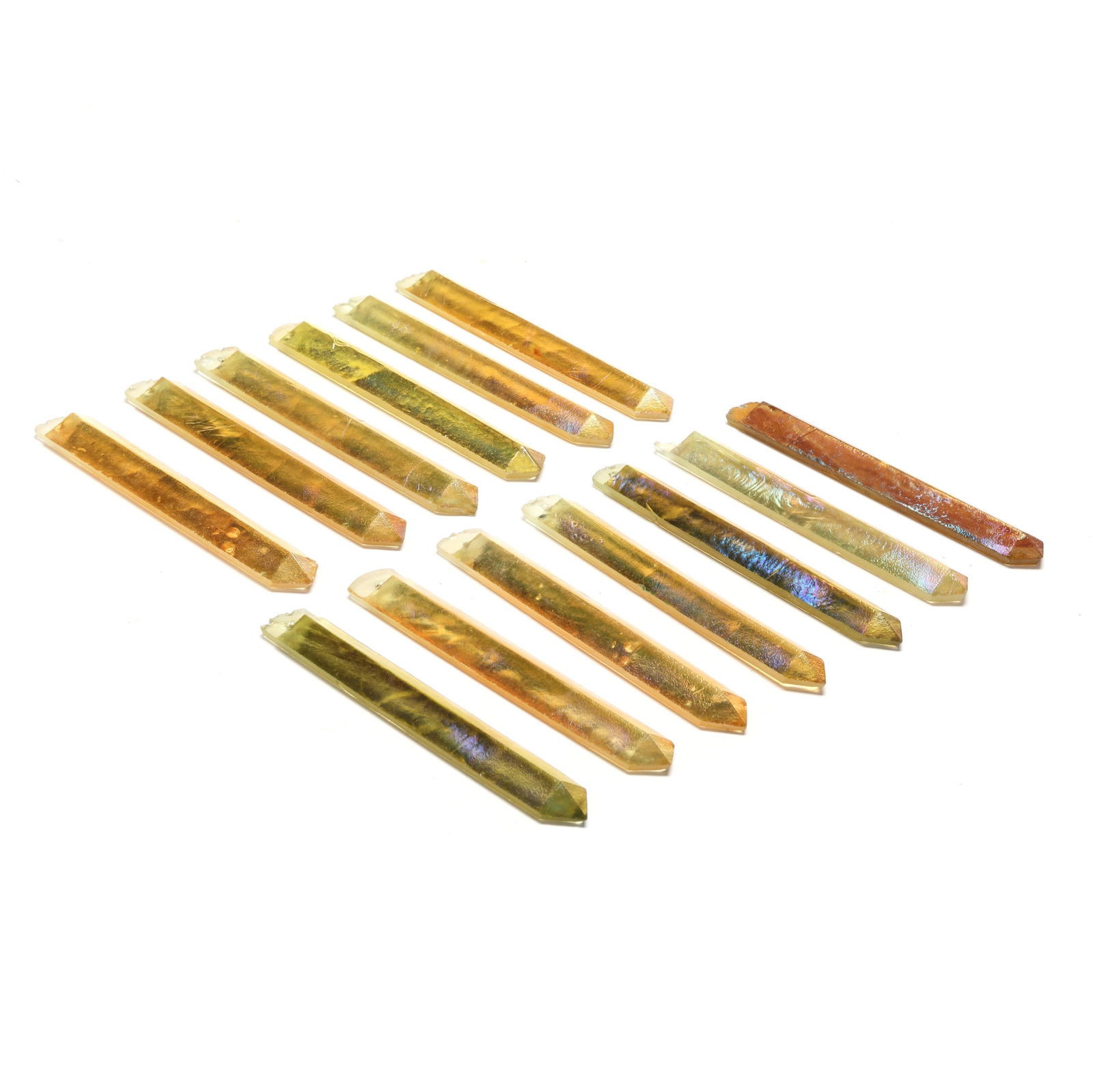 Attributed L.C. Tiffany, (13) Favrile Glass Prisms: Attributed L.C. Tiffany, (13) Favrile Glass Prismsearly 20th century, molded golden colored glass with iridescent surface, tri-paneled form, unmarked. 6.75 in. Additional high-resolution photos are a