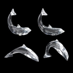 Four Baccarat Crystal Dolphins