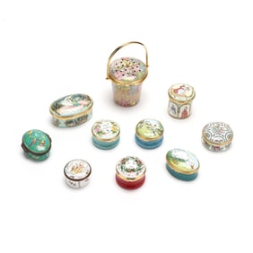 Ten English Enamel Pill Boxes, including a Music Box
